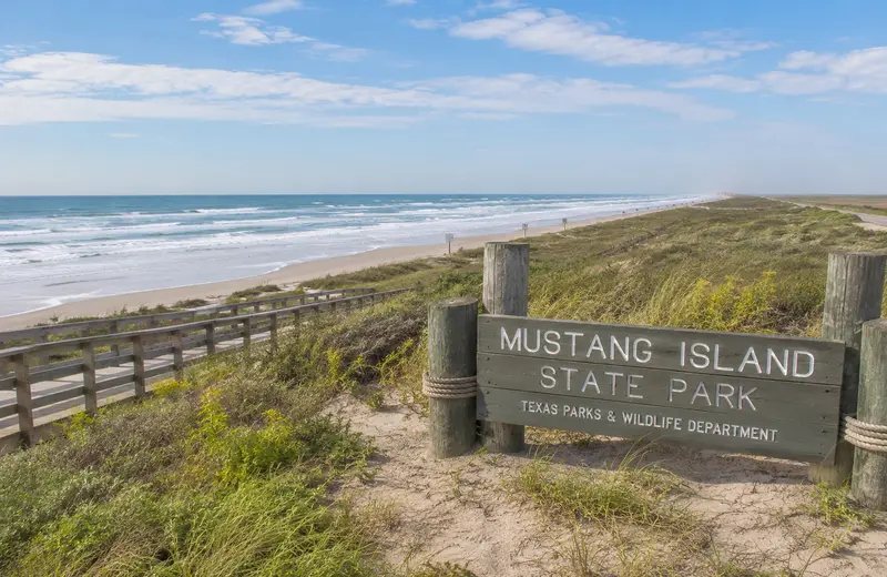 Boardwalk and sandy beach at Mustang Island State Park near Port Aransas.
