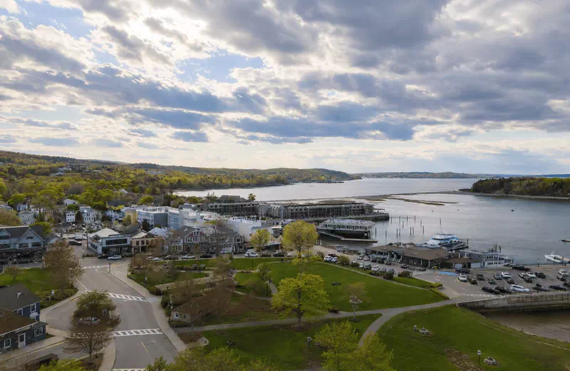 Coastal town of Bar Harbor, Maine under dramatic skies, the gateway to Acadia National Park