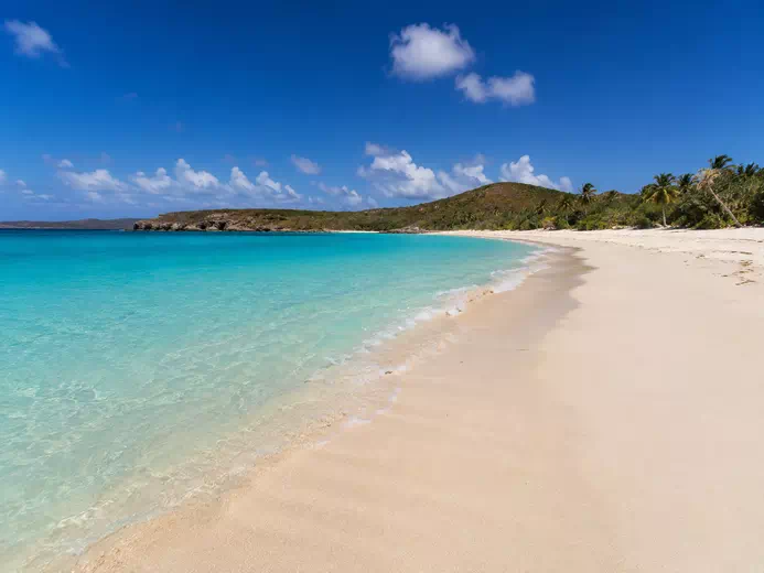 Flamenco Beach, Puerto Rico — A Horseshoe of White Sand With a Past